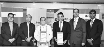  ??  ?? Pangilinan (third left) and Samir Gupta (third right) are seen with (from left) Villanueva,Vea, Gurdip Singh Sidhu, and Vijay Manoharan at the signing of the partnershi­p agreements in Manila recently.