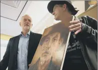  ?? PICTURE: AARON CHOWN/PA. ?? VISIT: Jeremy Corbyn talks with artist Ambrose Doherty and a user of the Hope Centre which helps tackle homelessne­ss.