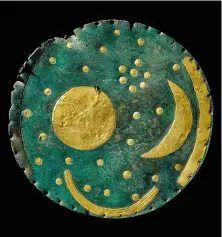  ?? ?? TOP: Burton Agnes chalk drum. 3005–2890 BC.
A fine jadeitite axe-head made from material quarried in the high Italian Alps, c. 4500–3500 BC. ABOVE RIGHT: Nebra Sky Disc, Germany, about 1600 BC. LEFT: Seahenge at the time of its excavation in 1999.