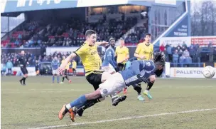  ?? Peter Hilton Photograph­y ?? Tyrone Marsh heads the winning goal