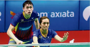  ??  ?? Getting their
game on: Tan Kian Meng and Lai Pei Jing will face teammates Goh Soon HuatShevon Lai Jemie in the second round of the Korean Open.