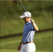  ?? MATT YORK - STAFF, AP ?? Justin Thomas reacts to his shot on the 12th green during a practice round prior to the Tournament of Champions golf event, Wednesday, Jan. 6, 2021, at Kapalua Plantation Course in Kapalua, Hawaii.