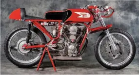  ??  ?? ABOVE: The 1963 250cc Moto Morini Provini road to second in the world championsh­ip – officially verified, with his signature on the tank