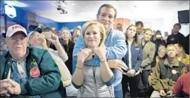  ?? Jae C. Hong
Associated Press ?? TED AND HEIDI CRUZ in Ringsted, Iowa, last week. In addition to her resume and charm, the former California­n is a major fundraiser in his campaign.