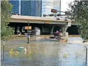  ??  ?? Oklahoma Highway Patrol troopers rescued about 60 people this week from floodwater­s in Houston.