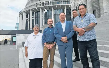  ?? Photo / Supplied ?? Minister of Treaty Negotiatio­ns Andrew Little (second from left) with Rudy Taylor (left) and Pita Tipene (Te Kotahitang­a), and Hone Sadler (behind) and Sonny Tau (Tu¯horonuku) earlier this year.