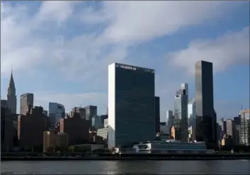 ?? AP PHOTO/MARk LEnnIHAn ?? In this Oct. 10 photo, Trump World Tower (right) rises above the United Nations headquarte­rs (center) in New york.