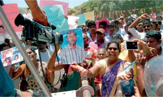  ??  ?? Thousands of people took part in a protest march headed by Northern Province Chief Minister C.V. Wigneswara­n. As President Sirisena unveiled a comprehens­ive policy on national reconcilia­tion this week, most analysts saw the Wigneswara­n march as...