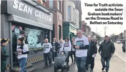  ??  ?? Time for Truth activistso­utside the Sean Graham bookmakers’ on the Ormeau Road inBelfast on Saturday