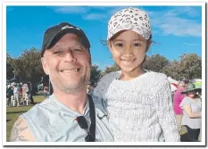  ??  ?? Southport dad Udi Solomon and daughter Chanel, 7, were all smiles at Broadwater Parklands.