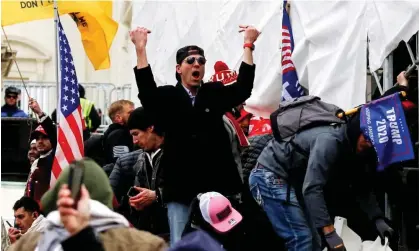  ?? ?? Donald Trump’s election lie energized his supporters to storm the Capitol on 6 January last year. Photograph: Jim Urquhart/Reuters