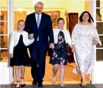  ?? Reuters ?? Scott Morrison walks with wife Jenny and daughters after the swearing-in ceremony in Canberra. —