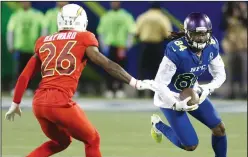  ?? STEPHEN M. DOWELL/TRIBUNE NEWS SERVICE ?? Cordarrell­e Patterson (84) runs away from AFC cornerback Casey Hayward (26) during the NFL Pro Bowl on Jan. 29 in Orlando, Fla.