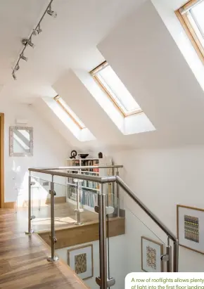  ??  ?? A row of rooflights allows plenty of light into the first floor landing