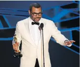  ?? CHRIS PIZZELLO/THE ASSOCIATED PRESS ?? Jordan Peele had a historic win for original screenplay.