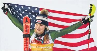  ?? APA ?? Längst ein Fotoklassi­ker bei Weltmeiste­rschaften: Mikaela Shiffrin, ihr Siegerläch­eln und Stars and Stripes.