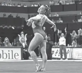  ?? MATT PENDLETON/GAINESVILL­E SUN ?? Florida gymnast Leanne Wong performs on the floor against the LSU Tigers during a meet at Exactech Arena at the Stephen C. O’Connell Center in Gainesvill­e on Feb. 23.