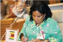  ?? ?? First Lady Dr Auxillia Mnangagwa signs the declaratio­n of Zim - babwe’s commitment to ensuring sustainabl­e food production and provision of clean water among other necessitie­s to children during the 1st Asia Pacific Africa Women’s Economic Exchange Summit in Tokyo, Japan, yesterday