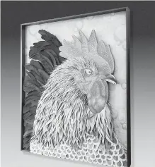  ??  ?? The mixed-media Silver Penciled Rock Rooster by the Rupperts includes hat makers’ felt remnants, metal flashing and carved wood.