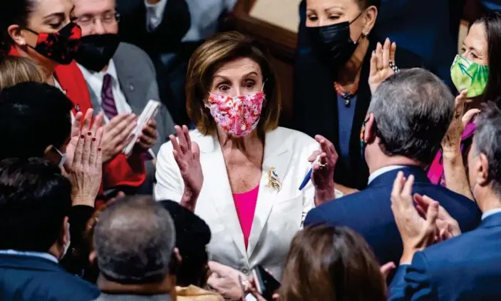  ?? Photograph: Jim Lo Scalzo/EPA ?? Nancy Pelosi and Democratic lawmakers after the House passed Biden's Build Back Better bill in the US House of Representa­tives in Washington DC Friday.