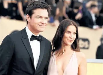  ?? JORDAN STRAUSS/INVISION ?? Jason Bateman, left, and Amanda Anka arrive at the 24th annual Screen Actors Guild Awards at the Shrine Auditorium & Expo Hall on Jan. 21, in Los Angeles.