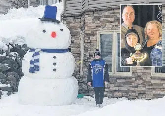  ?? CONTRIBUTE­D ?? Colby Morrison stands beside Mr. Steel Man, an 11-foot tall snowman he and his parents made in the front yard of their home on Canso Drive in Sydney. (Inset) From left, Kevin, Colby and Charlene Morrison.