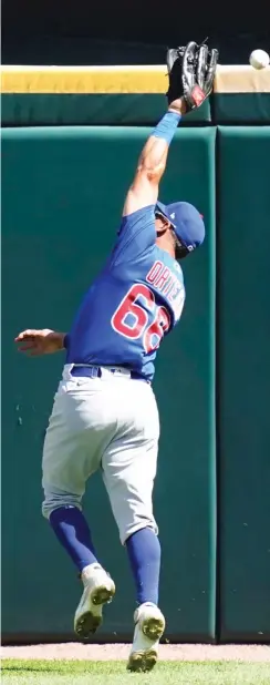  ?? NAM Y. HUH/AP ?? Cubs center fielder Rafael Ortega can’t run down a two-run double by the Sox’ Jose Abreu in the fifth inning Sunday.