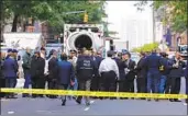  ?? Justin Lane EPA/Shuttersto­ck ?? POLICE stand guard on a closed street after a bomb alert at the Time Warner offices in New York.