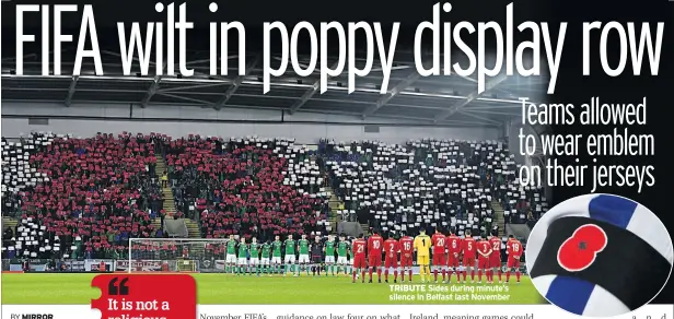  ??  ?? TRIBUTE Sides during minute’s silence in Belfast last November