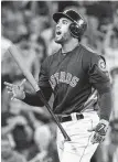  ?? Karen Warren / Staff photograph­er ?? The Astros’ George Springer laments leaving two runners on with a game-ending popup.