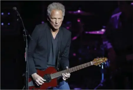  ??  ?? Lindsey Buckingham performs recently at the Michigan Theater in Ann Arbor KEN SETTLE