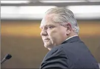  ?? CP PHOTO ?? Ontario PC Leader Doug Ford takes questions from journalist­s during a prebudget lock-up as the Ontario Provincial Government prepares to deliver its 2018 Budget at the Queens Park Legislatur­e in Toronto on Wednesday, March 28.