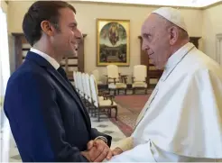  ?? ?? The Holy See: President Macron was also in handshake mode yesterday when he met Pope Francis at the Vatican