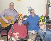  ??  ?? On song Volunteer entertaine­rs Rev Harry Mowbray, Andy Lang, Jim Low and Jim Webster