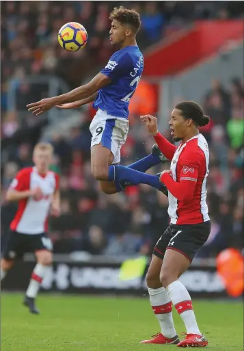  ??  ?? Dominic Calvert-Lewin of Everton rises above Virgil van Dijk of Southampto­n.