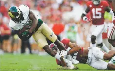  ?? AP FILE PHOTO ?? Alabama defensive back Minkah Fitzpatric­k, right, tackles Colorado State wide receiver Michael Gallup during a Sept. 16 game in Tuscaloosa, Ala. Fitzpatric­k is a possible first round pick in the NFL Draft.