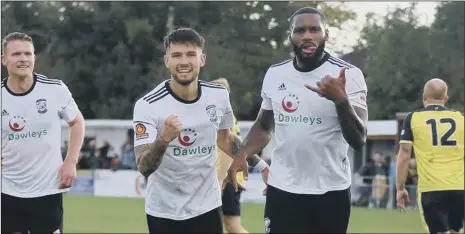  ?? Picture: Hereford FC ?? UP FOR THE CUP Lennell John-Lewis, right, celebrates his opening goal at Privett Park