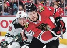  ?? GETTY IMAGES FILE PHOTO ?? Blackhawks’ Alex DeBrincat, right, is poised to be a big part of Chicago’s future and could easily break the 30-goal mark with more ice time.