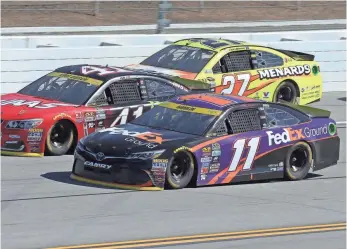  ?? MARVIN GENTRY, USA TODAY SPORTS ?? Denny Hamlin (11), heading to a third-place finish Sunday at Talladega Superspeed­way, moves on in the Chase for the Sprint Cup after winning a tiebreaker vs. Austin Dillon.