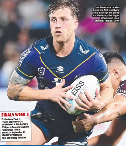  ??  ?? Cam Munster is tackled during the NRL qualifying final between the Storm and the Manly Sea Eagles at Sunshine Coast Stadium. Picture: Getty