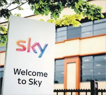  ?? Leon Neal Getty Images ?? THE HEADQUARTE­RS of satellite TV company Sky in London. 21st Century Fox owns 39% of Sky and has offered nearly $15 billion to acquire the rest. Sky reaches 22 million pay-TV subscriber­s.