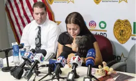  ?? MATIAS J. OCNER mocner@miamiheral­d.com ?? Nidia Vega hugs her daughter, Luciana, 4, during a press conference on Thursday while pleading for informatio­n about her husband’s death.