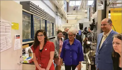  ?? John Moritz / Hearst Connecticu­t Media / ?? Energy Secretary Jennifer Granholm, center, and U.S. Rep. Joe Courtney, D-2nd District, tour the Center for Clean Energy Engineerin­g lab at the University of Conneticut in Storrs on Friday, May 20, 2022.