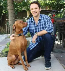  ??  ?? Daniel Nardinelli with Mckinley, the office’s four-legged co-worker and companion