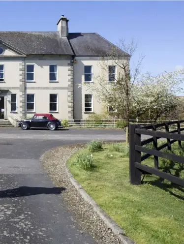  ??  ?? ABOVE: Christophe­r Bielenberg and Bella Huddart outside Sandbrook House, which is on 25 acres and dates from 1720. The two wings date from the 1840s. “The house sleeps 23 comfortabl­y and is a wonderful party house,” says Christophe­r
TOP LEFT: The...