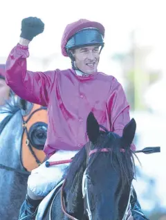  ??  ?? TRUE CHAMPION: Lonhro ridden by Darren Beadman returns to scale after winning the George Ryder Stakes in 2004,