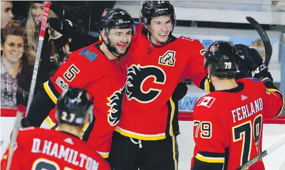  ?? AL CHAREST ?? The Calgary Flames top line of Sean Monahan, centre, Micheal Ferland, right, and Johnny Gaudreau have combined for 10 goals and 32 points during a seven-game winning streak.