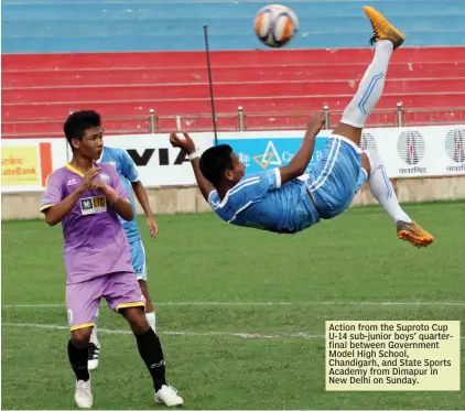  ??  ?? Action from the Suproto Cup U-14 sub-junior boys’ quarterfin­al between Government Model High School, Chandigarh, and State Sports Academy from Dimapur in New Delhi on Sunday.