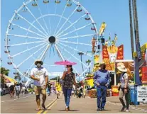  ?? NANCEE E. LEWIS U-T FILE ?? The midway at the San Diego County Fair — home of rides, games and food — is at the center of a lawsuit.