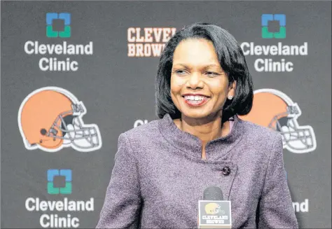  ?? AP PHOTO ?? Former secretary of state Condoleezz­a Rice talks with the media after visiting with the Cleveland Browns coaches and players at the Browns training facility in Berea, Ohio, in October 2010. Rice is a longtime Browns fan.